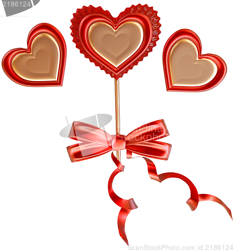 Image of lollipop tied with a bow with long ribbons