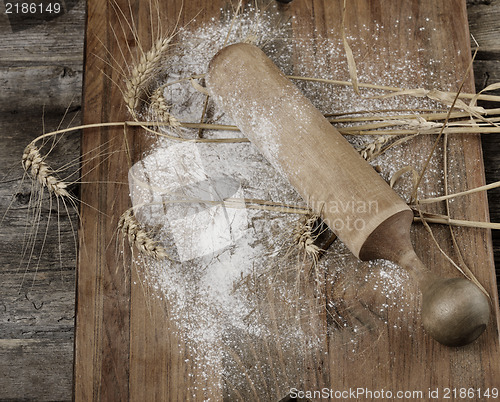 Image of Wooden Rolling Pin, Flour And  Wheat