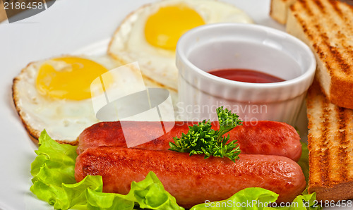Image of Fried eggs with sausages
