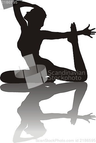 Image of Young woman practicing yoga