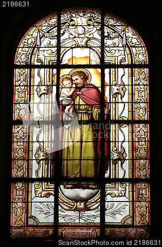 Image of Saint Joseph holding baby Jesus