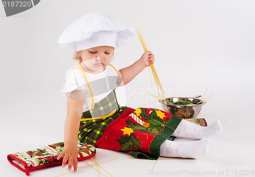 Image of baby girl in the cook hat