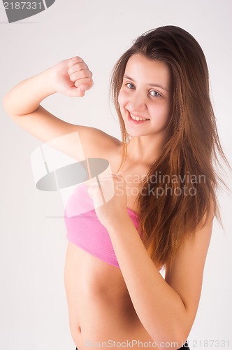 Image of Pretty girl doing fitness exercise