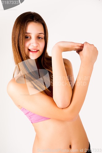 Image of Pretty girl doing fitness exercise