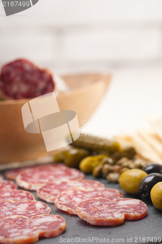 Image of cold cut platter with pita bread and pickles