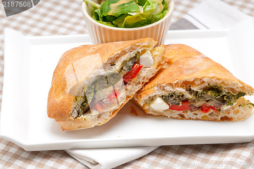 Image of ciabatta panini sandwichwith vegetable and feta