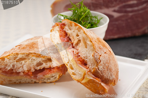 Image of ciabatta panini sandwich with parma ham and tomato