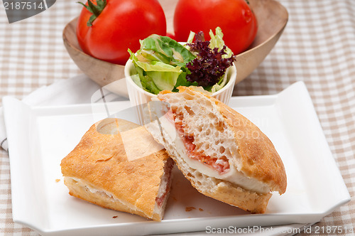 Image of ciabatta panini sandwich with parma ham and tomato