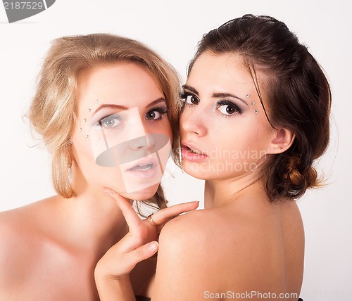 Image of two fashion photo of young sensual ladies
