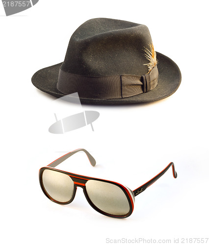 Image of Retro sunglasses, Classic black  felt trilby/fedora hat isolated on a white background.
