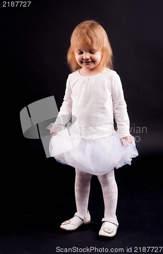 Image of 2 years old girl in white