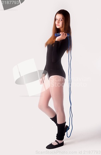 Image of fitness woman with jumping rope