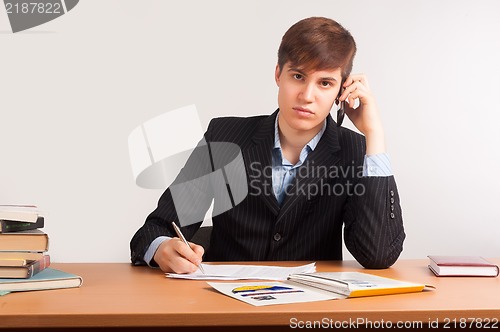 Image of Attractive man calling by mobile phone