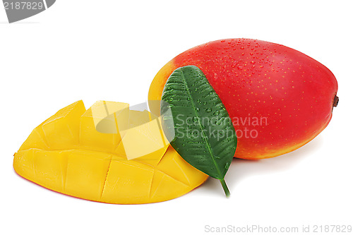 Image of Fresh mango fruit with cut and green leaves isolated on white ba