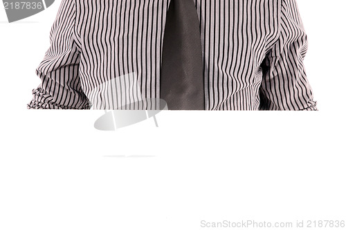 Image of Mans chest in tie and striped shirt