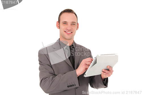 Image of Businessman working on his tablet