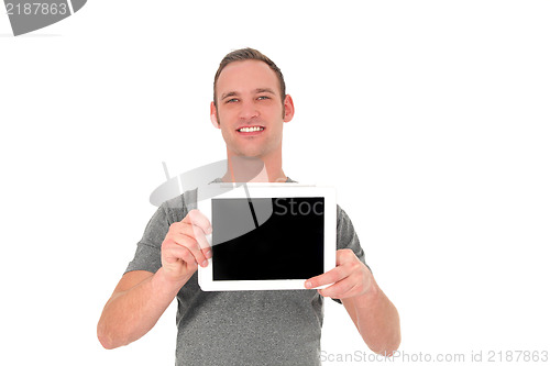Image of Smiling young man showing his tablet