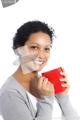 Image of Smiling woman with red cup of coffee