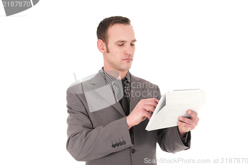 Image of Resposible businessman working on a Pc Tablet