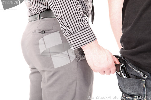 Image of Pickpocket stealing a wallet