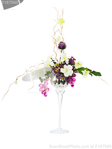 Image of  Floral arrangement from artificial flowers in glass goblet isol