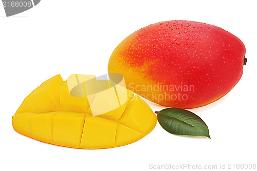 Image of Fresh mango fruit with cut and green leaves isolated on white ba