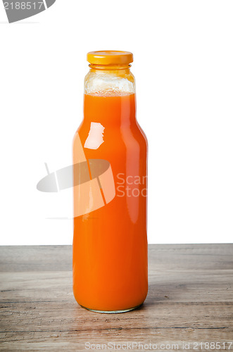 Image of Bottle with carrots juice, it is isolated on white