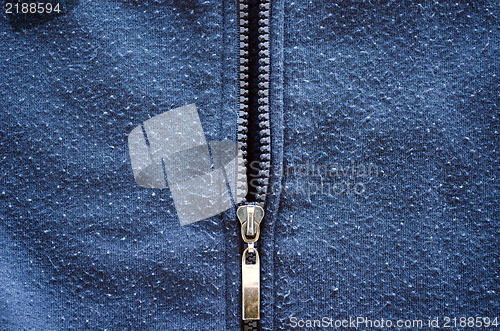 Image of jumper robe zipper unzip old worn fabric closeup 