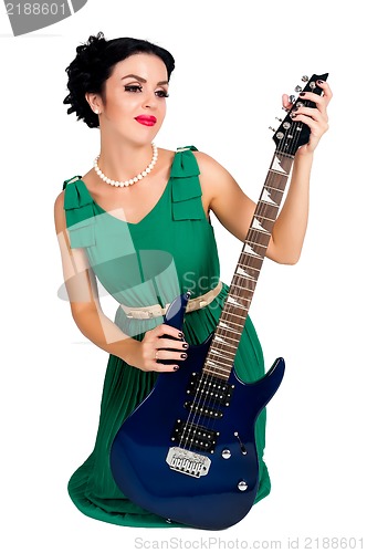 Image of Pretty woman with guitar