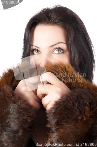 Image of beautiful girl in warm coat