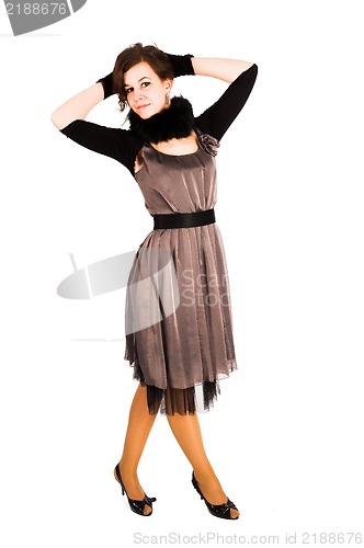 Image of Beautiful woman in dress and gloves