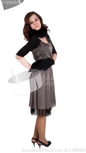 Image of Beautiful woman in dress and gloves