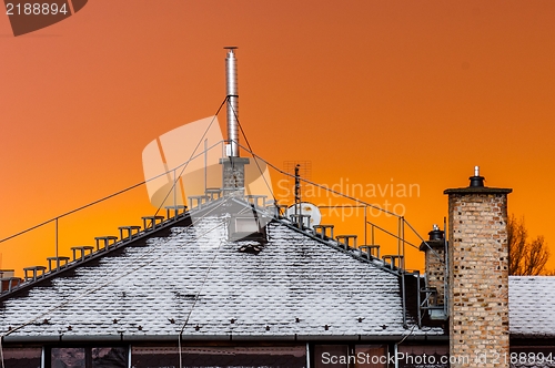 Image of Old house with snow covering it