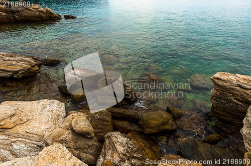 Image of Shore of an ocean with big rocks