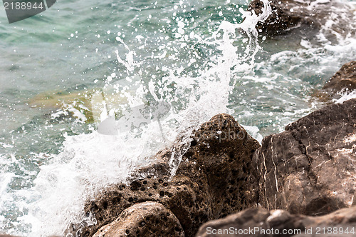 Image of Shore of an ocean with big rocks