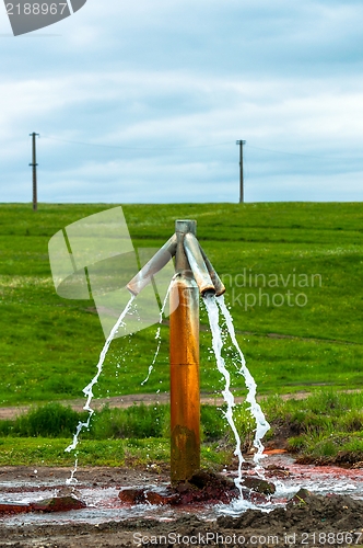 Image of Water flowing from outdoor tap