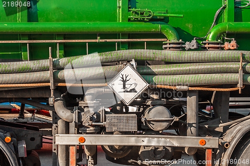 Image of Toxic waste car with danger sign