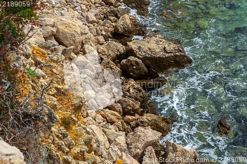 Image of Shore of an ocean with big rocks