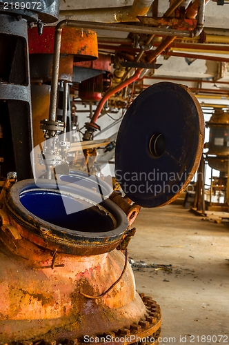 Image of Industrial interior with storage tank 