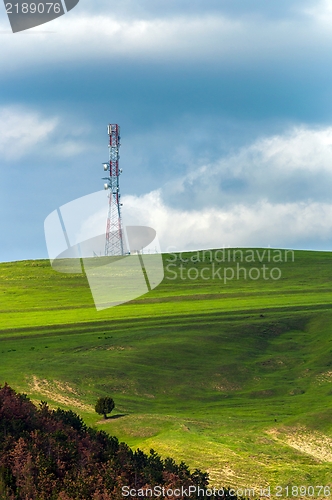 Image of Transmission tower with green fields