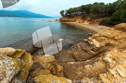 Image of Shore of an ocean with big rocks