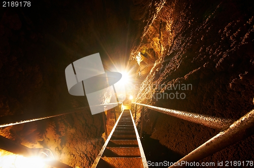 Image of Underground sataircase a cave with bright lighr