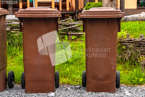 Image of Trashcan outdoors in a park