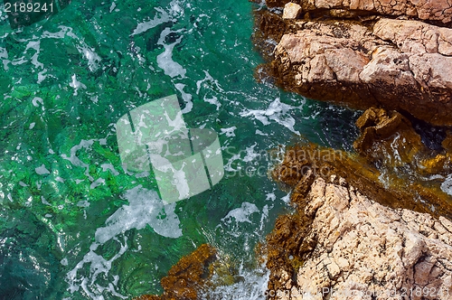 Image of Shore of an ocean with big rocks
