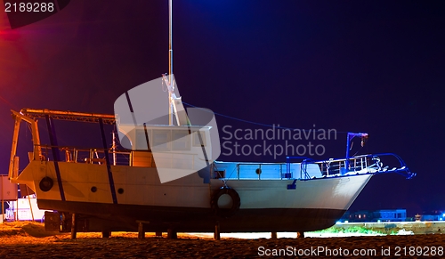 Image of Fishing boat at night