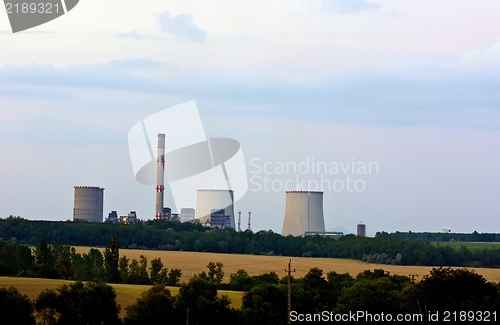 Image of Nuclear power station at dusk with cooling towers