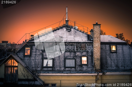 Image of Old house with snow covering it