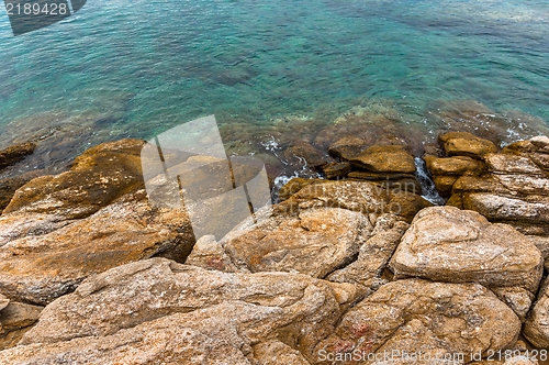 Image of Shore of an ocean with big rocks