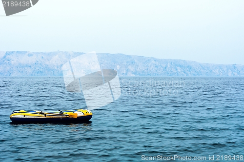 Image of Small rubber boat on the sea