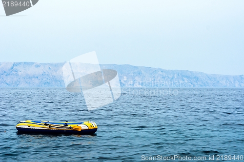 Image of Small rubber boat on the sea